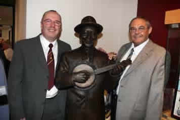 Gerry Mawdsley & Dennis at the statue unveiling.