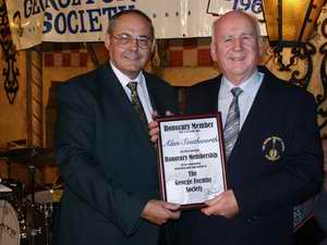 Alan Southworth receives his award.