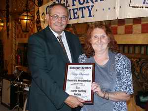 Kitty Barret receives her award.