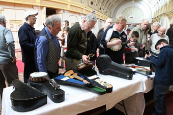 Brisk business on Ukes For Sale table.