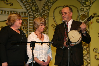 Gerry Mawdsley presents the missing uke to Geraldine.