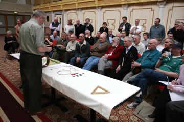 Dennis Mitchell lectures on the art of vellum replacement.