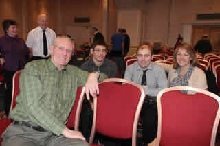 Dennis Mitchell with Jonathan, Matt and Chris.
