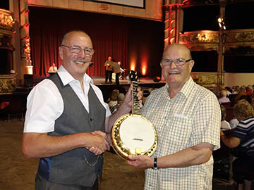 Gerry Mawdsley present Trevor Williams with his prize