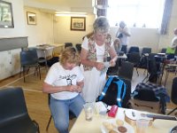 DSC02997  Kate and Lesley sort out the raffle tickets.