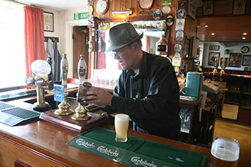 Dave checks the beer